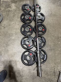 700 Pound Olympic Weights Bar Set