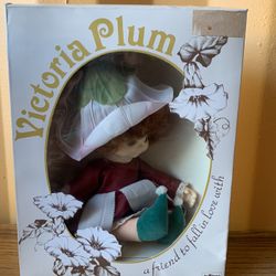 Vintage Victoria plum doll