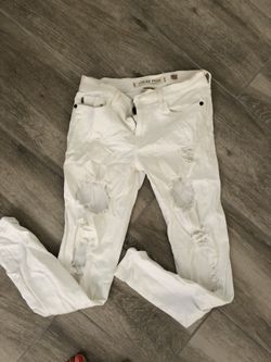 White ripped jeans