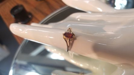 Gold ring with precious stone