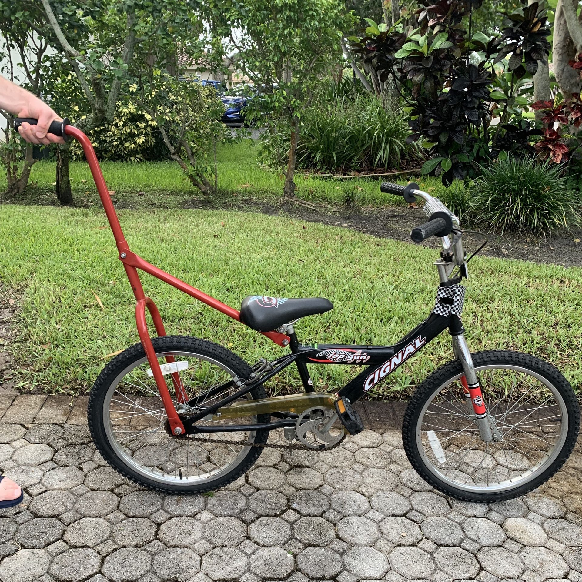 Kids Red bicycle with training stick