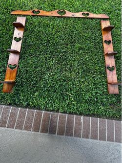3 vintage-style wooden heart-cutout shelves