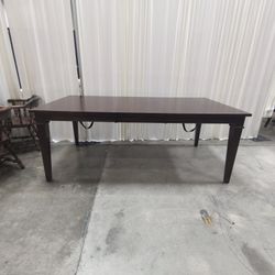 Dark Brown Wood Extendable Dining Table with Tapered Legs