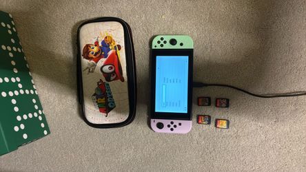 Nintendo Switch w/ Games and Case