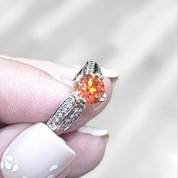 Ladies Mexican Fire Opal and Diamond ring.