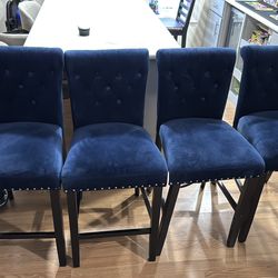 Counter height bar stools with beautiful blue velour cloth
