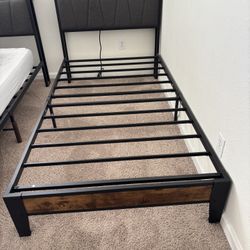 Tharsiga Upholstered Bed