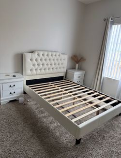 Full size leather bed.