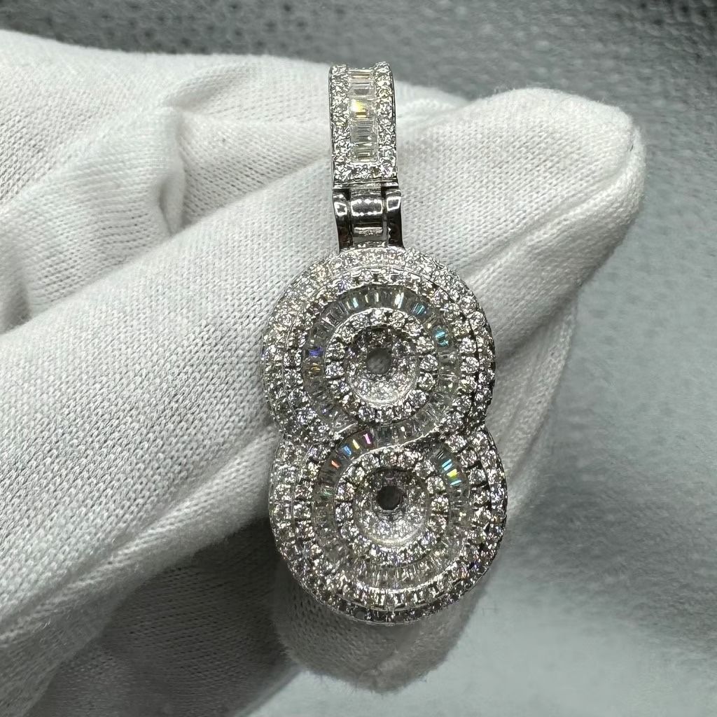 A Moissanite Number charm in Silver with Moissanite of 2.66  CTW 