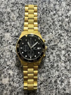 Gold watch $20
