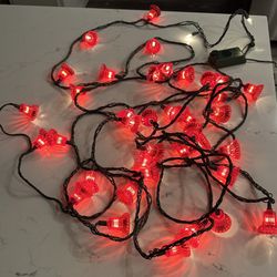 Vintage Musical String Red Bell Lights 27 feet long. Plays different Christmas Songs. Has volume control  And a switch to change light pattern and tur
