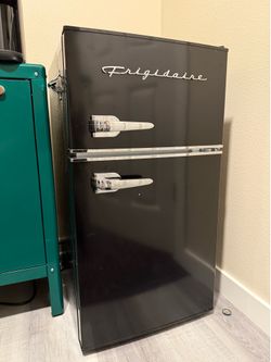 Kitchenette mini frig freezer, keying coffee maker toaster oven and microwave