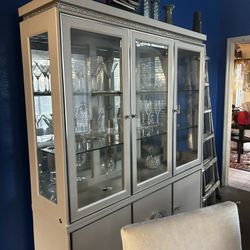 Glass China cabinet that matches eight piece dining set