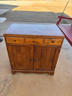 Wood storage cabinet with drawer and doors