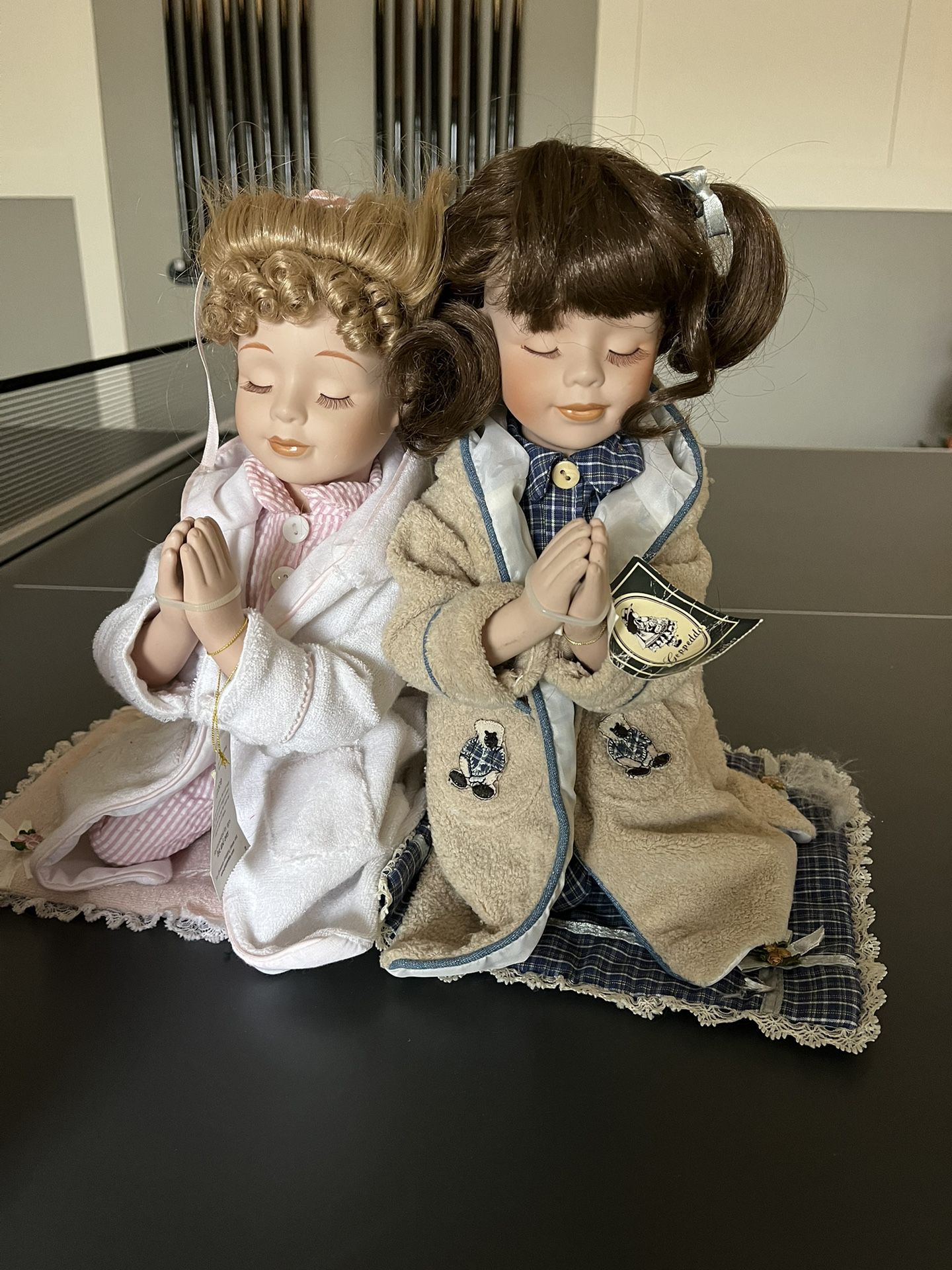 Geppeddo Praying Porcelain Dolls