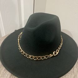 A dark Green cowboy Hat 
