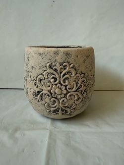 Decorative Beige Terracotta Clay Garden Pot Featuring an Intricate, Raised Scroll Medallion