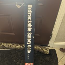 Retractable safety gate