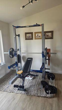 Exercise machine. Bench. Rack. Barbell. Horizontal bar.
