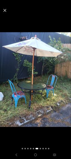 Patio Table chairs umbrella table $35 each packages available.