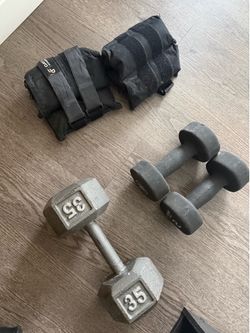 35 lb dumbbell, 12 lbs dumbbell (2), 6 lb ankle weights (2)