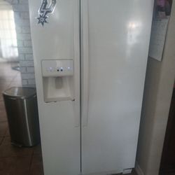 Whirlpool refrigerator/freezer..good clean drinking water...works good