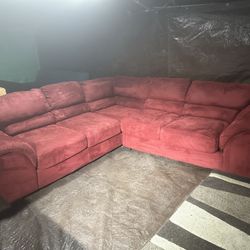 Red couch 200 we deliver for a fee