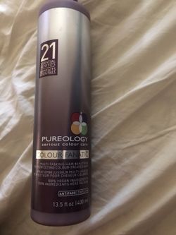 Big bottle of pureology leave in conditioner