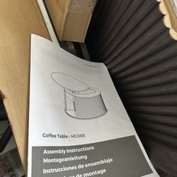 Round lift top coffee table still in box