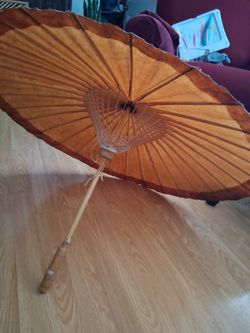 Asian umbrella old like the weather