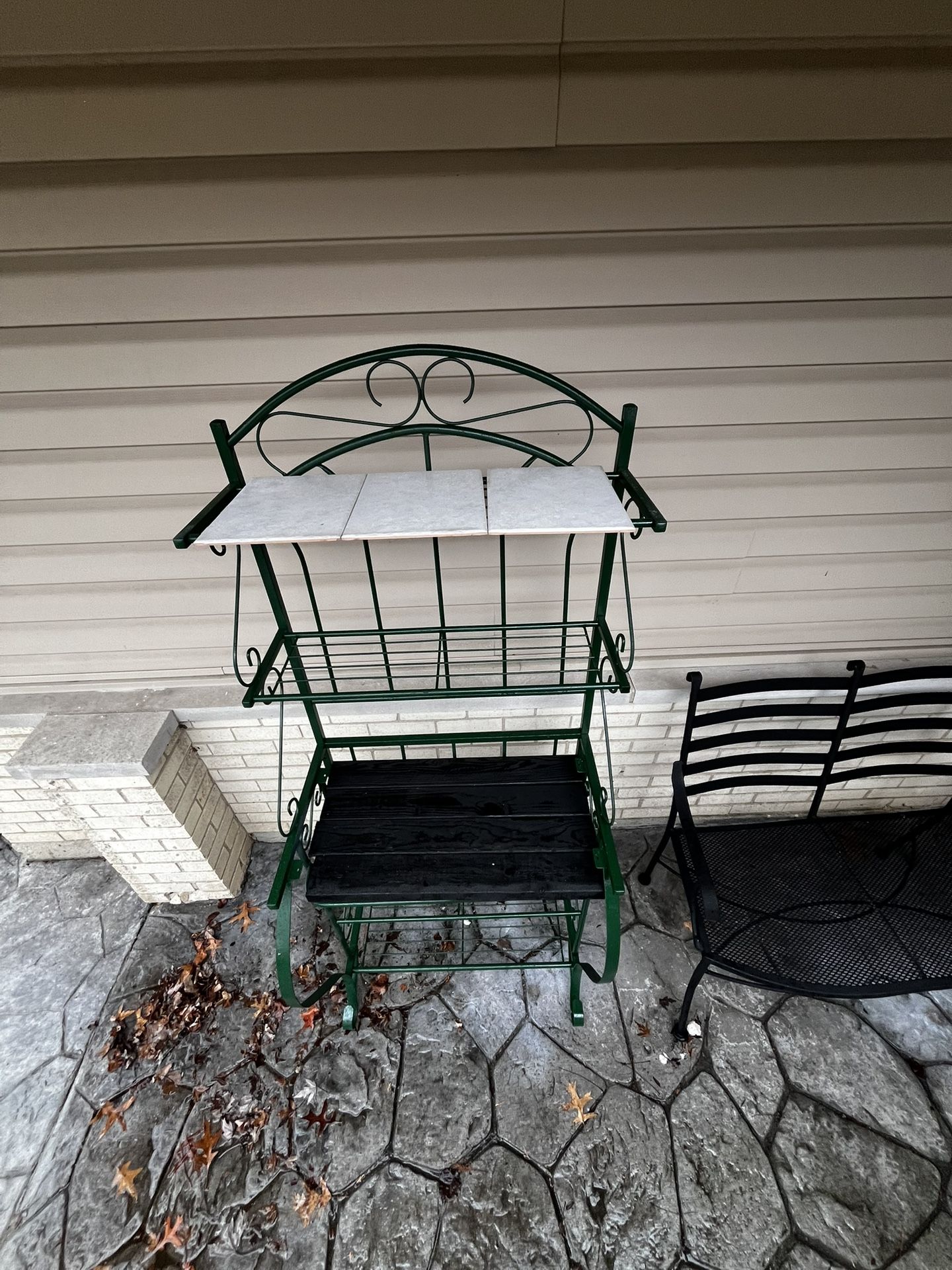 5 tiered green metal bakers rack outdoor garden shed newly painted new wood no rust or damage. Ceramic tile top Please watch video If you see this, it