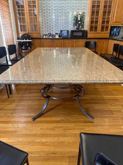 95 inch Granite dining table with wrought iron bases
