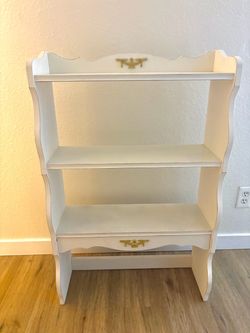 White ornate shelves