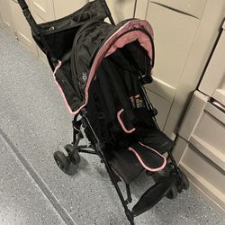 Light Weight Stroller Super Cute And Has Zip Pouch To Store Stuff And Cup Holder 