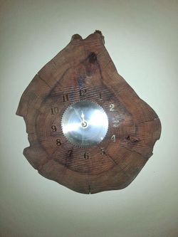 Clock, wooden with saw blade