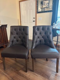 2 lether chairs