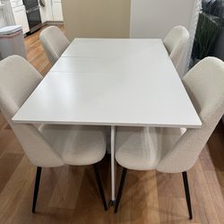Small folding white table with 4 cozy fuzzy chairs