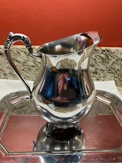  E. B. Rogers Silver Company Pleated Footed Pitcher 