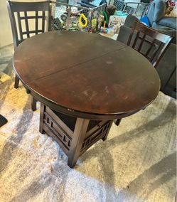 Solid wood table and four chairs