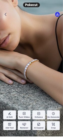 A Marchesa Cubic Zirconia gold-tone curved bar adjustable slider bracelet NWT