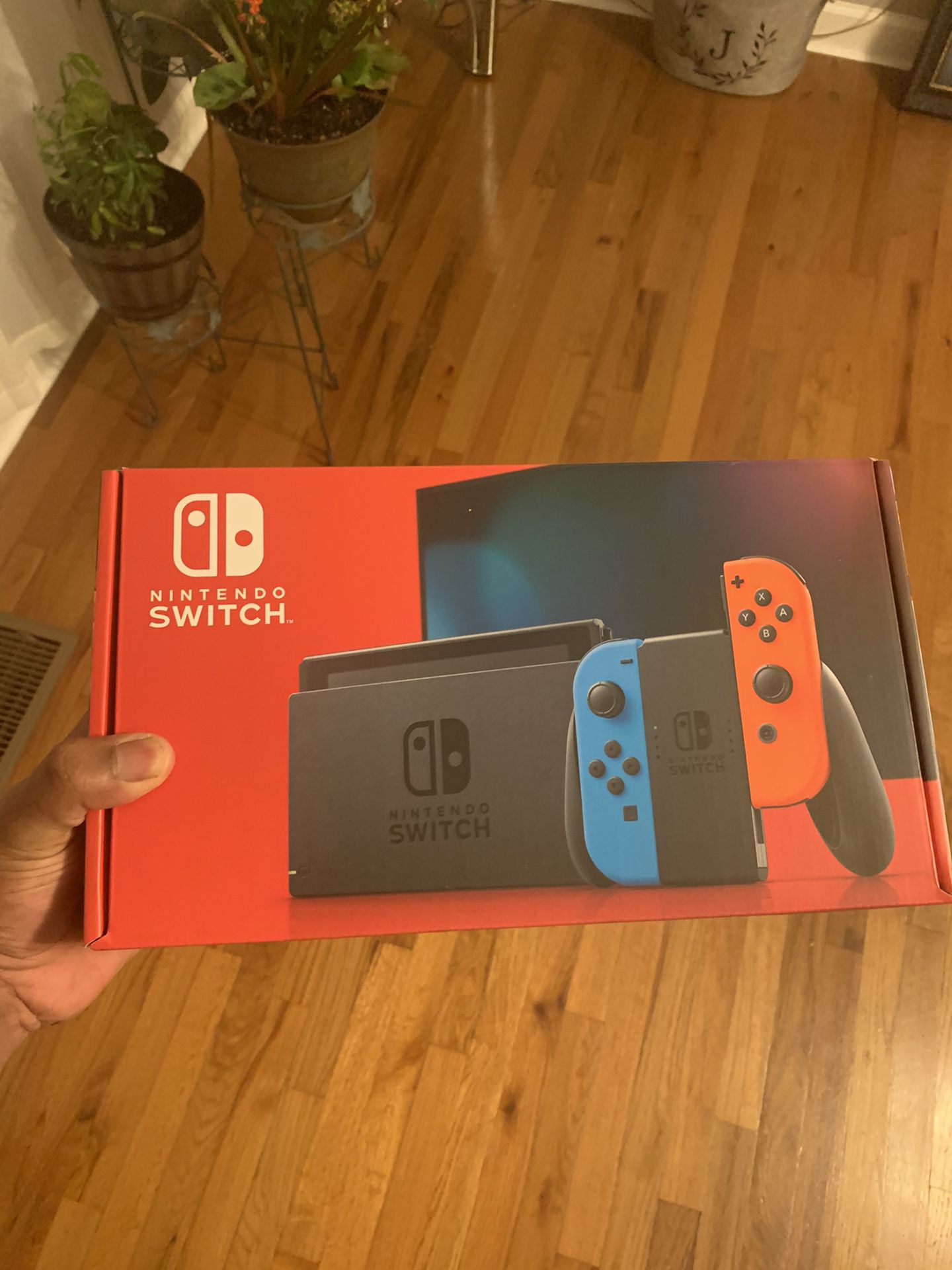 Nintendo switch brand new with color controllers