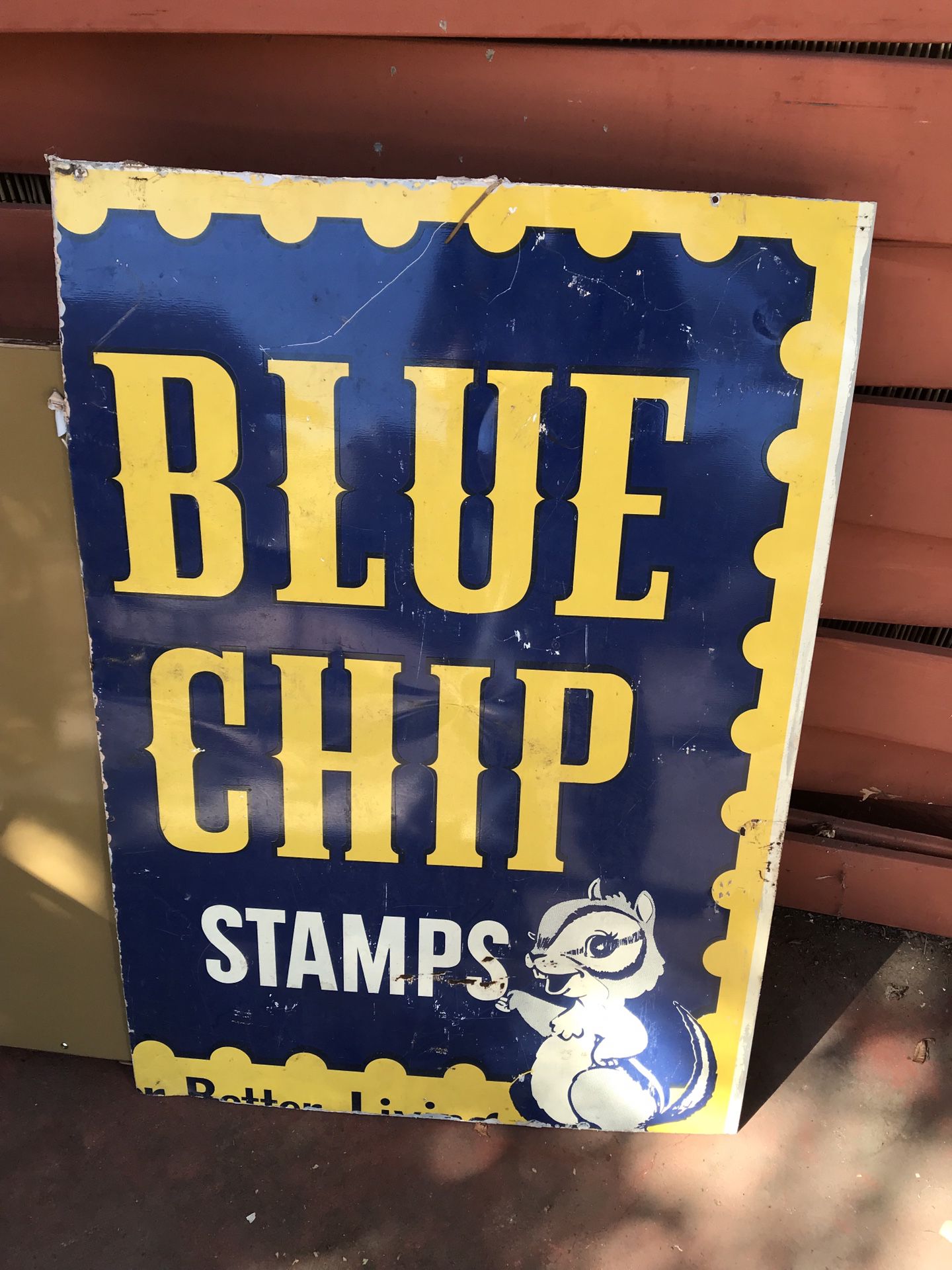 Old metal blue chip stamps sign 26 in wide 37 3/4 in tall.