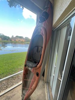 Pelican Kayak with cover, paddles, extra drain plugs and roof rack