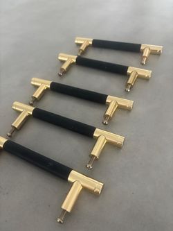 5 drawers handles with leather grip in the middle .. 4” bet screws.. $30 for all