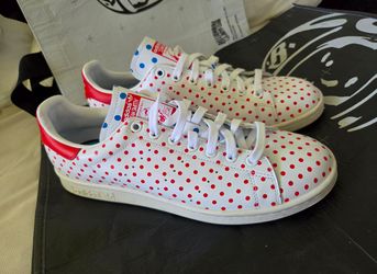 Adidas x Pharrell Williams Stan Smith Small Polka Dot sneakers white and red.