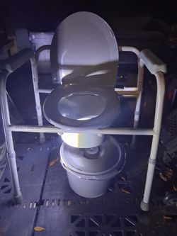 Medical bed side toilet.  Used once