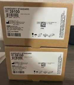Two Humidifiers and 5 bag filters with 2 filters per pack