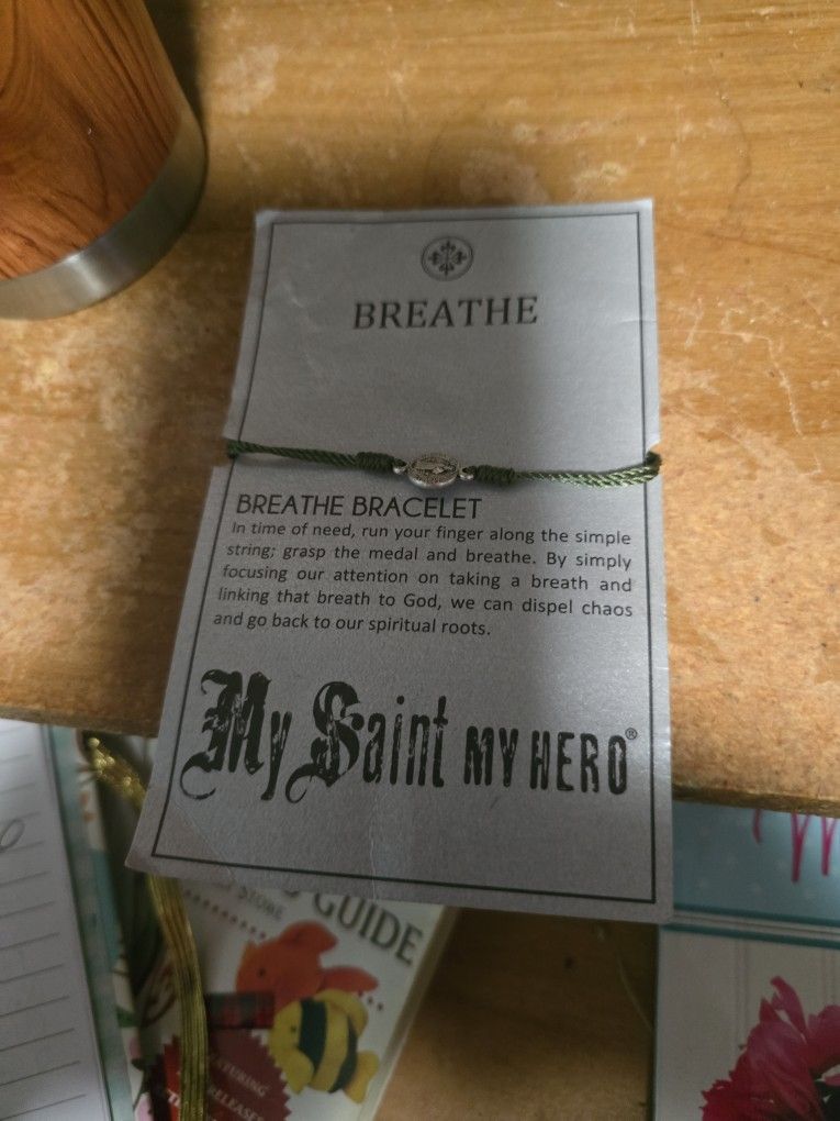 My Saint My Hero Breathe Bracelet Made With Silver Plated Metal On Olive Hand Woven Cord Made In Scotland