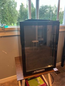 Black mini fridge with glass door