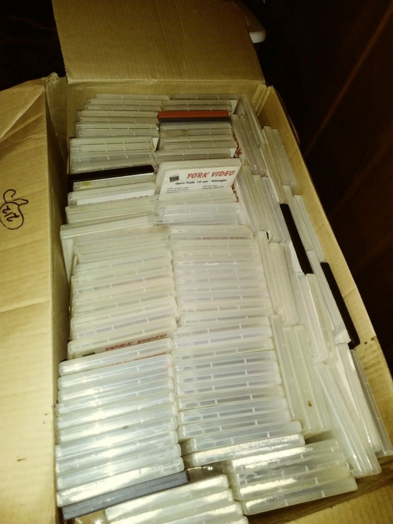 Box full of empty cases movie cds